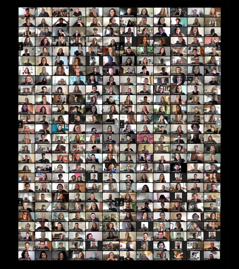 A large online GUT gathering shown as a grid of hundreds of video-call portraits