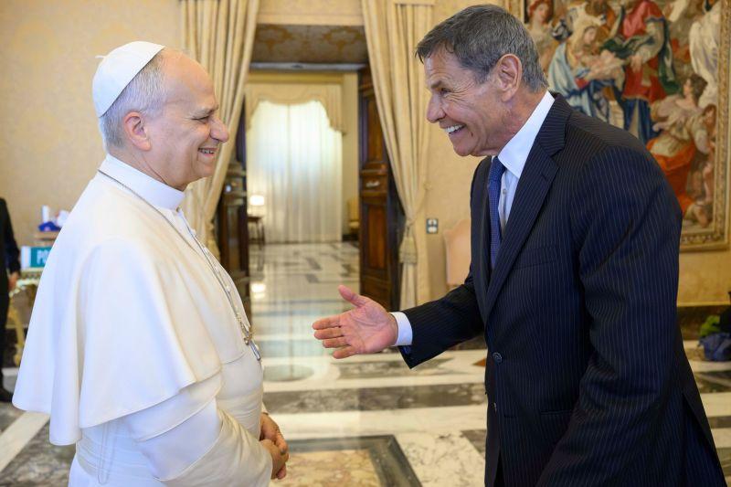 Guy Chipparoni smiling and speaking with Pope Leo XIV during the Chicago delegation’s visit
