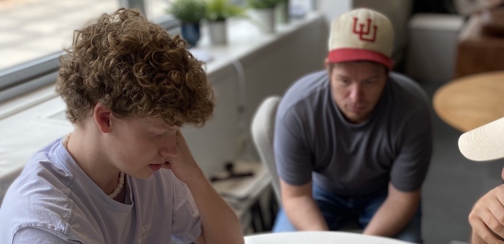 Hadrius team members working together at a table