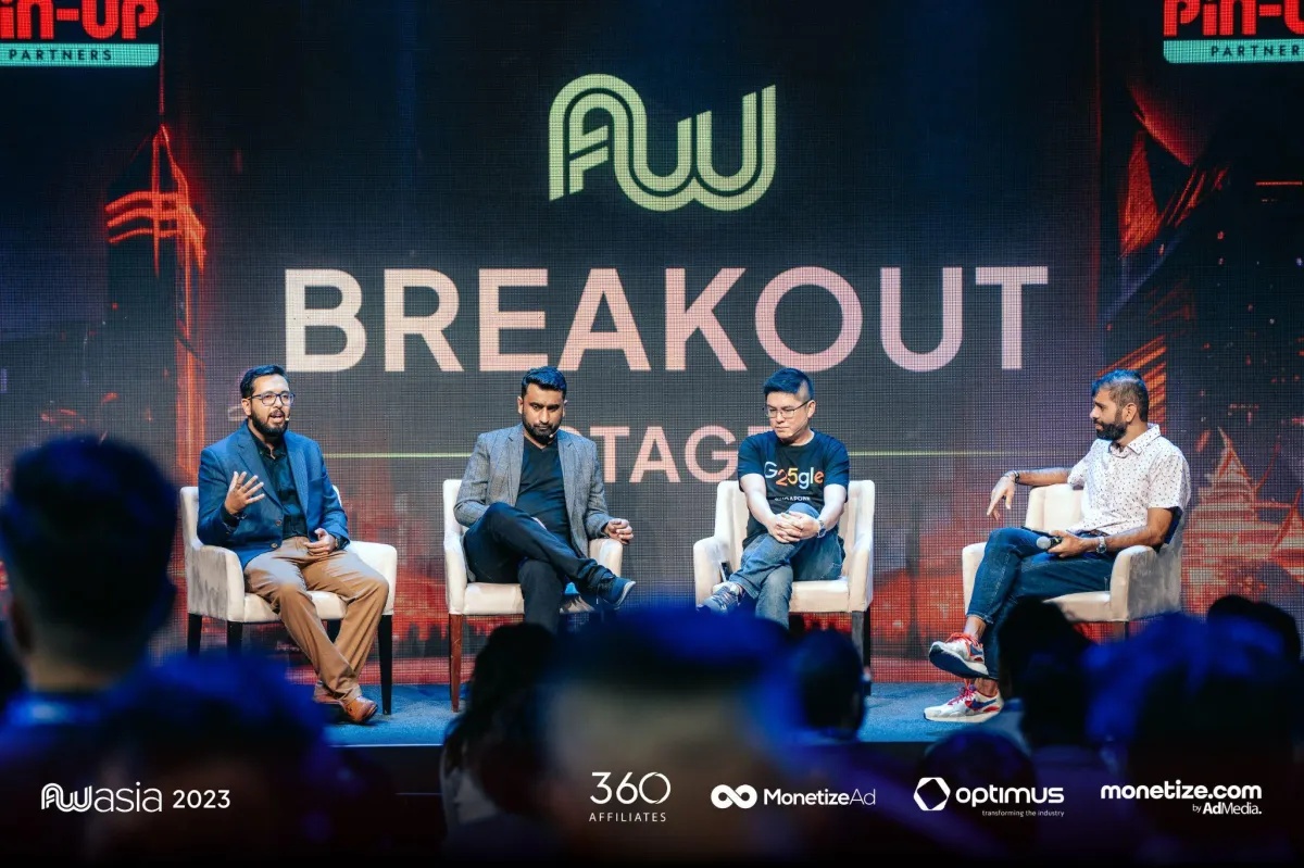 Hafiz Ahmad Ashfaq, seated at the far left in a blue blazer, speaking on an Affiliate World Asia 2023 panel