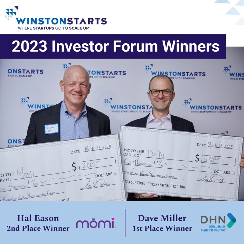 Hal Eason and Dave Miller holding prize checks at the 2023 Winston Starts Investor Forum