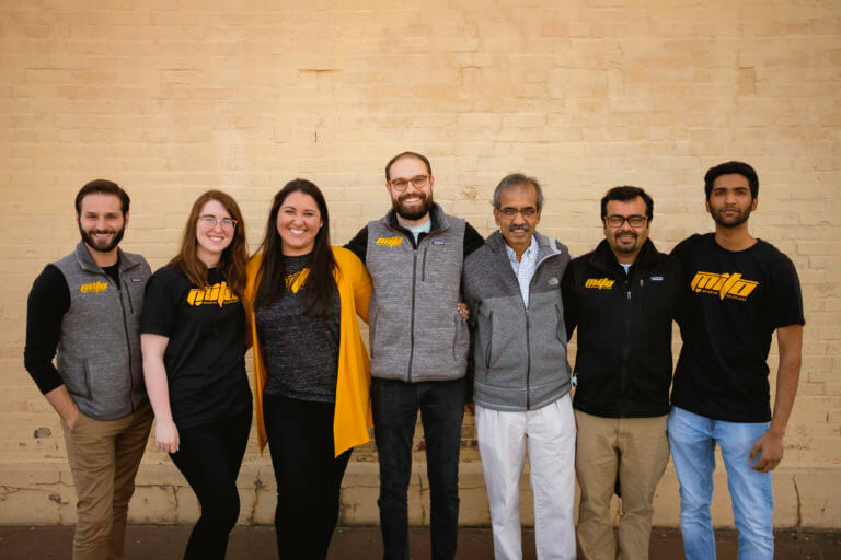 Haley Marie Keith, third from left, with members of the MITO team