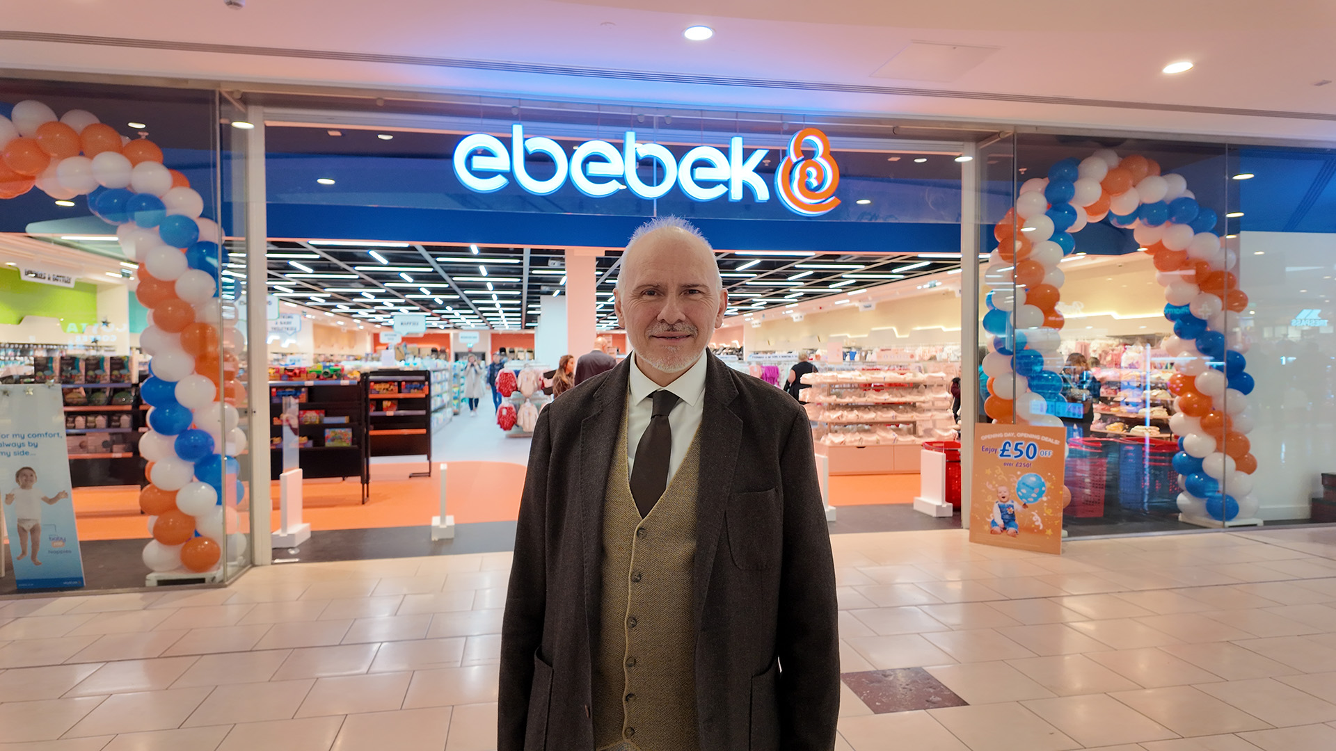 Halil Erdoğmuş outside ebebek’s Lakeside Shopping Centre store, framed by opening balloons