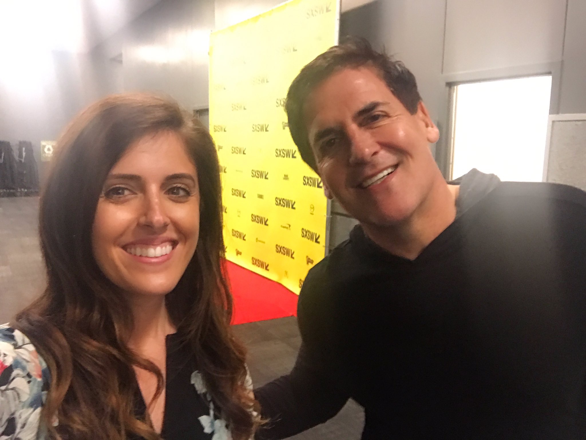 Halle Tecco and Mark Cuban smiling together at SXSW
