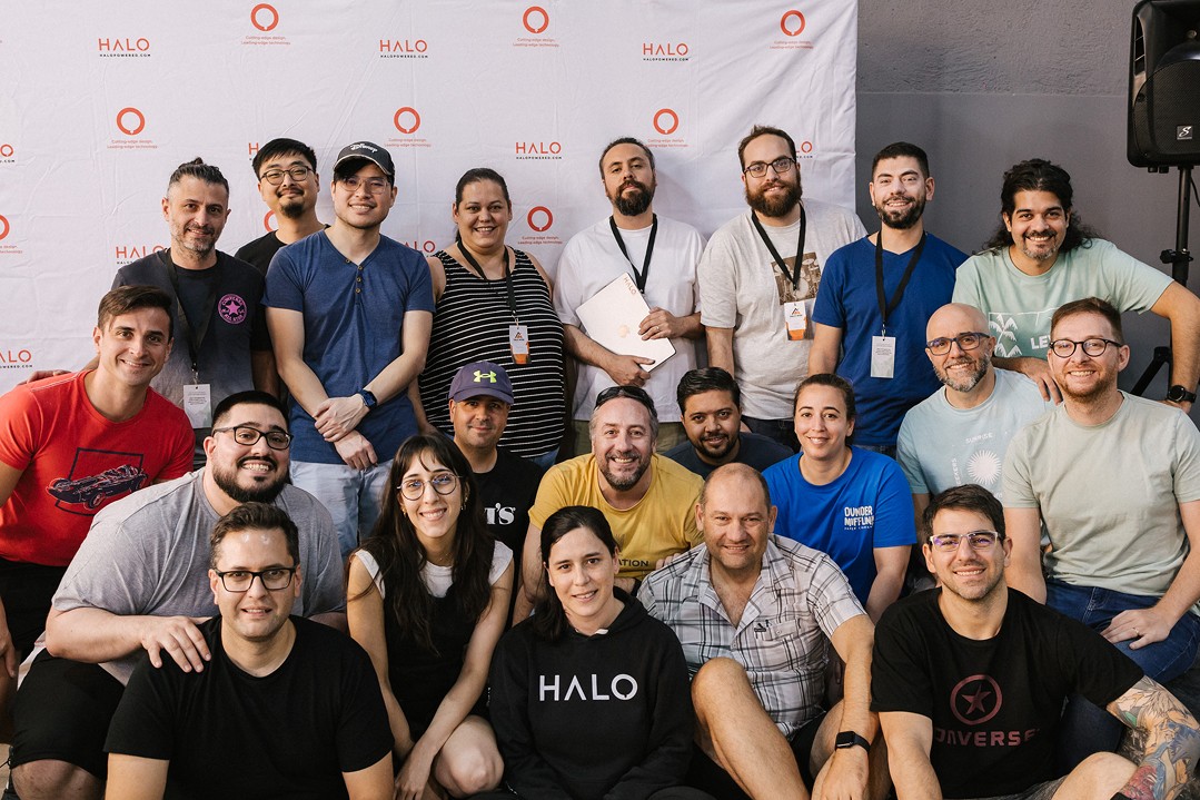 A group of Halo team members gathered for a photograph