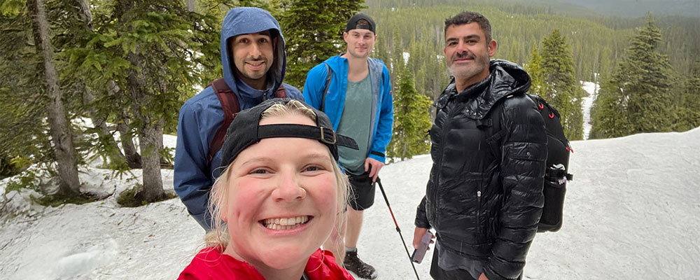 Hamed Babai and companions on a snowy leadership-retreat hike