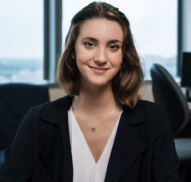Hannah McKenney-Klepcha seated in an office during Starling Medical's early years