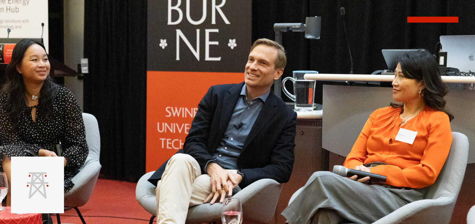 Hanno Blankenstein seated at the centre of an energy-transition panel at Swinburne University