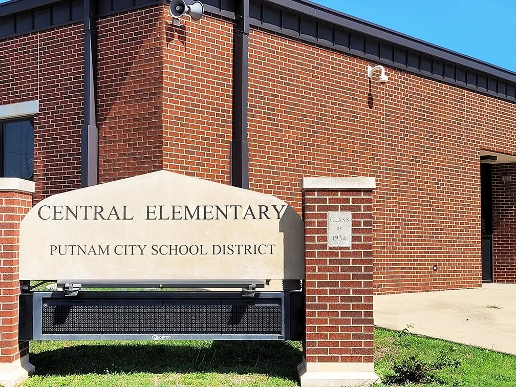 Central Elementary School sign and brick building in Putnam City School District