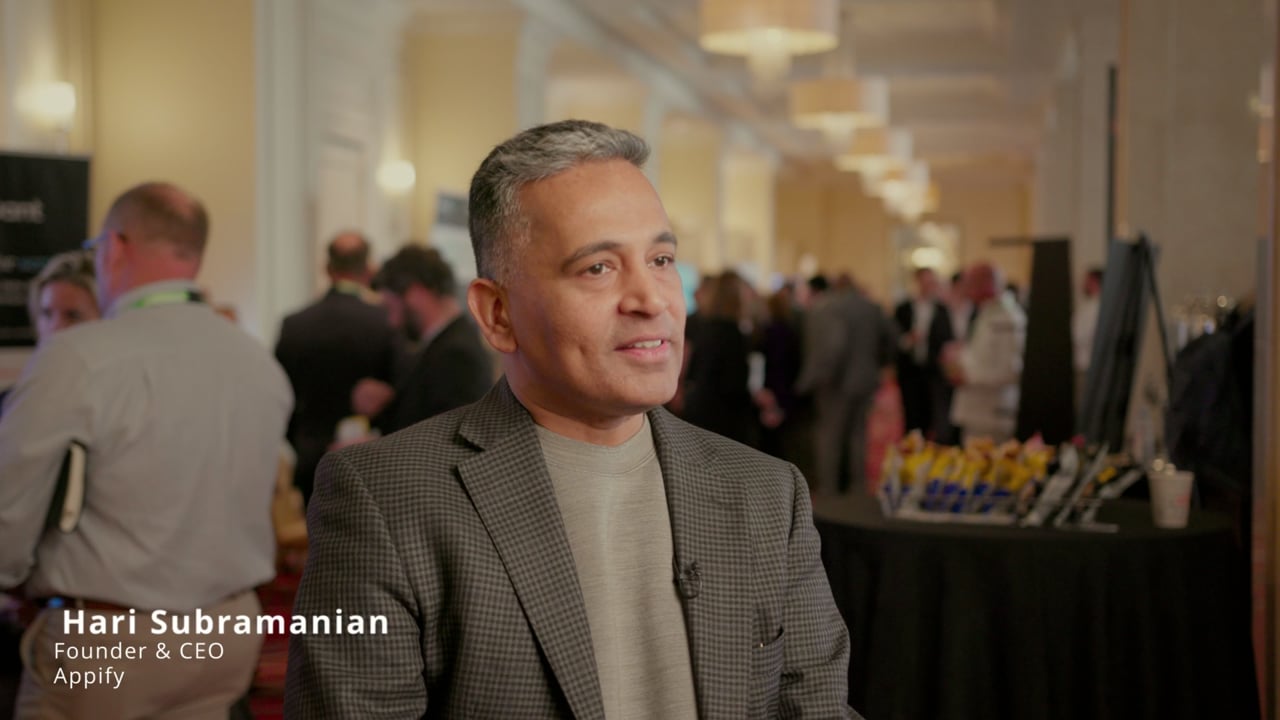 Hari Subramanian speaking at the 2023 Smarter Services Executive Symposium