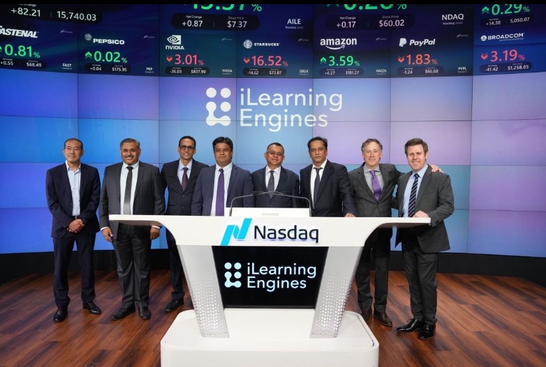 Harish Chidambaran, at the center behind the podium, with the iLearningEngines delegation at Nasdaq