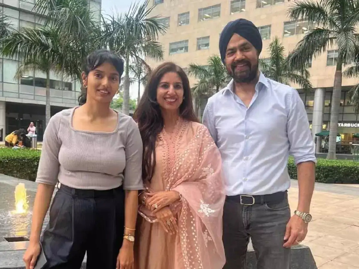 Meenakshi Singh, Monica Bindra and Harmeet Bindra standing together outdoors