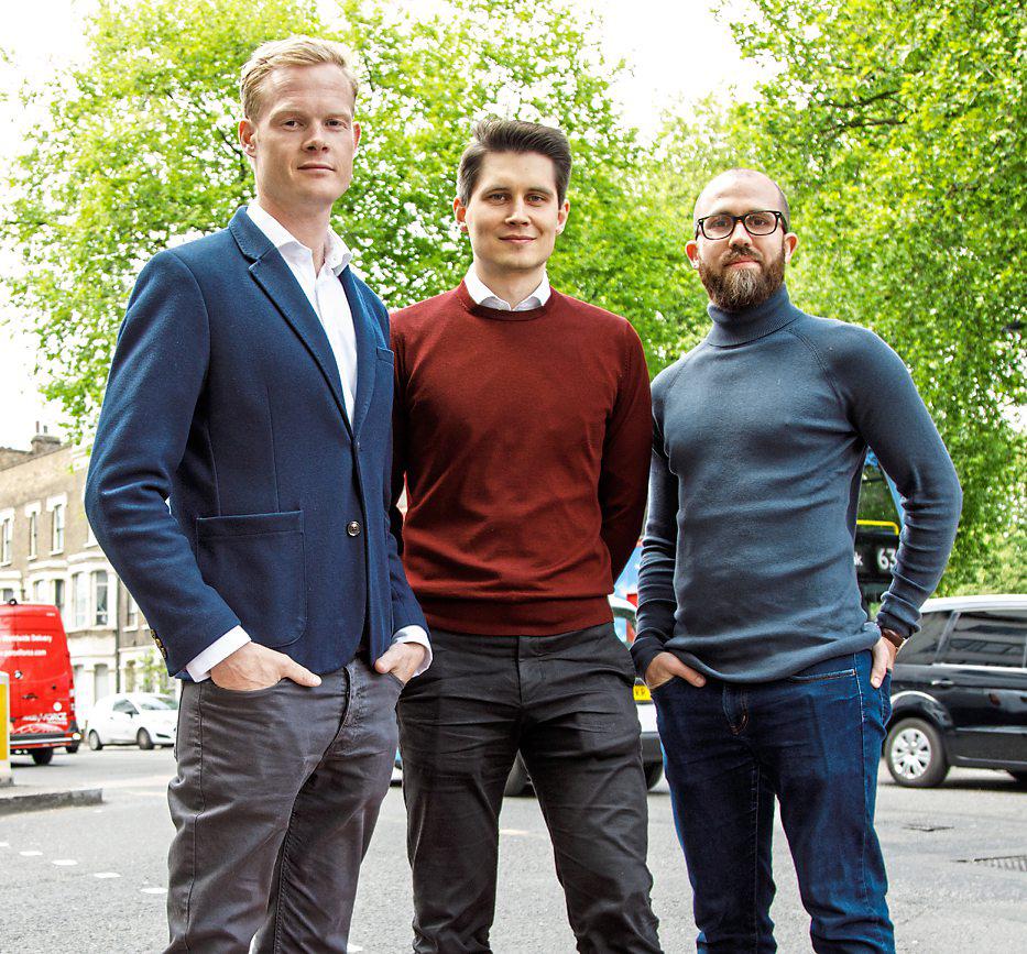 Harry Franks on the left, Sten Saar in the centre and Stuart Kelly on the right, standing together outdoors