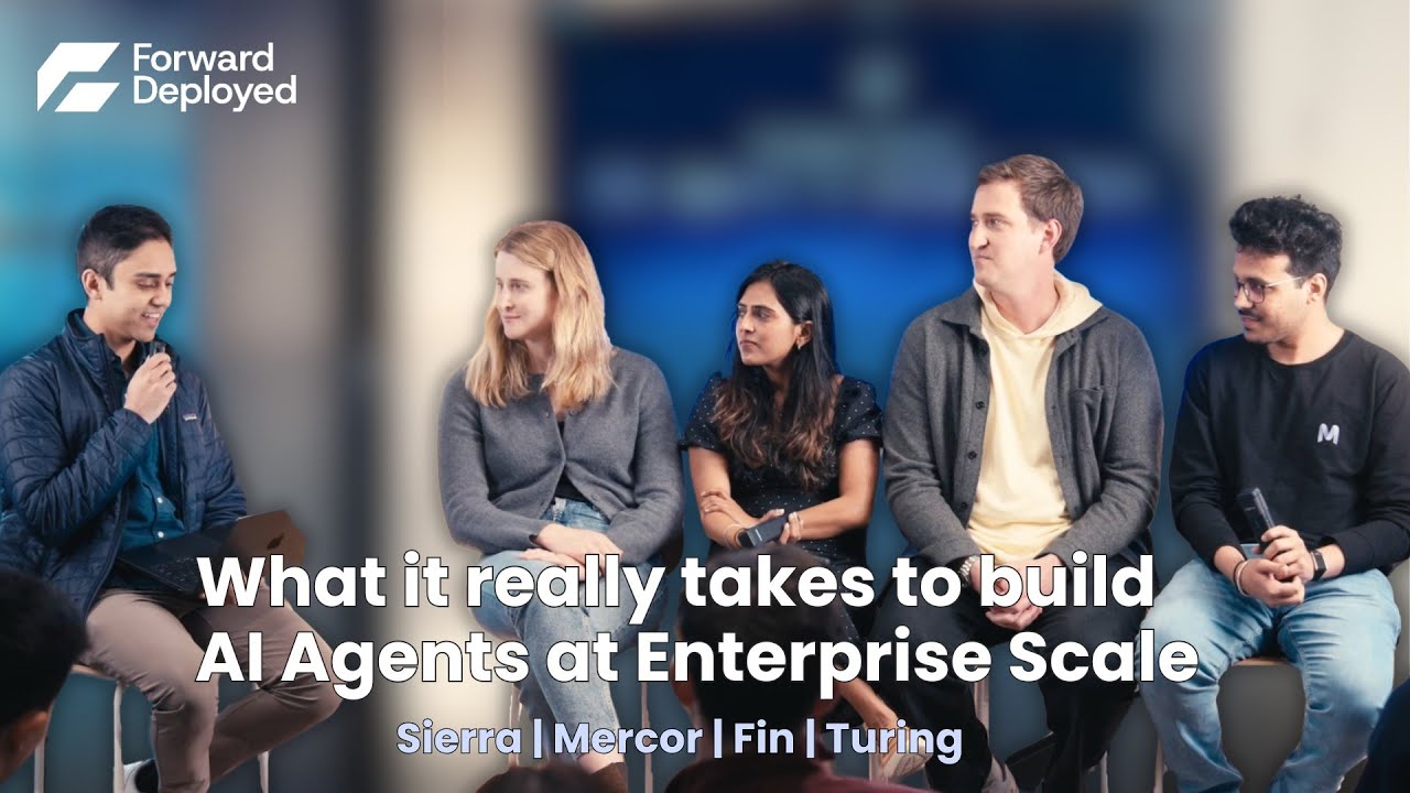 Five speakers seated for a panel about enterprise AI agents, with Harsh Trivedi at far right