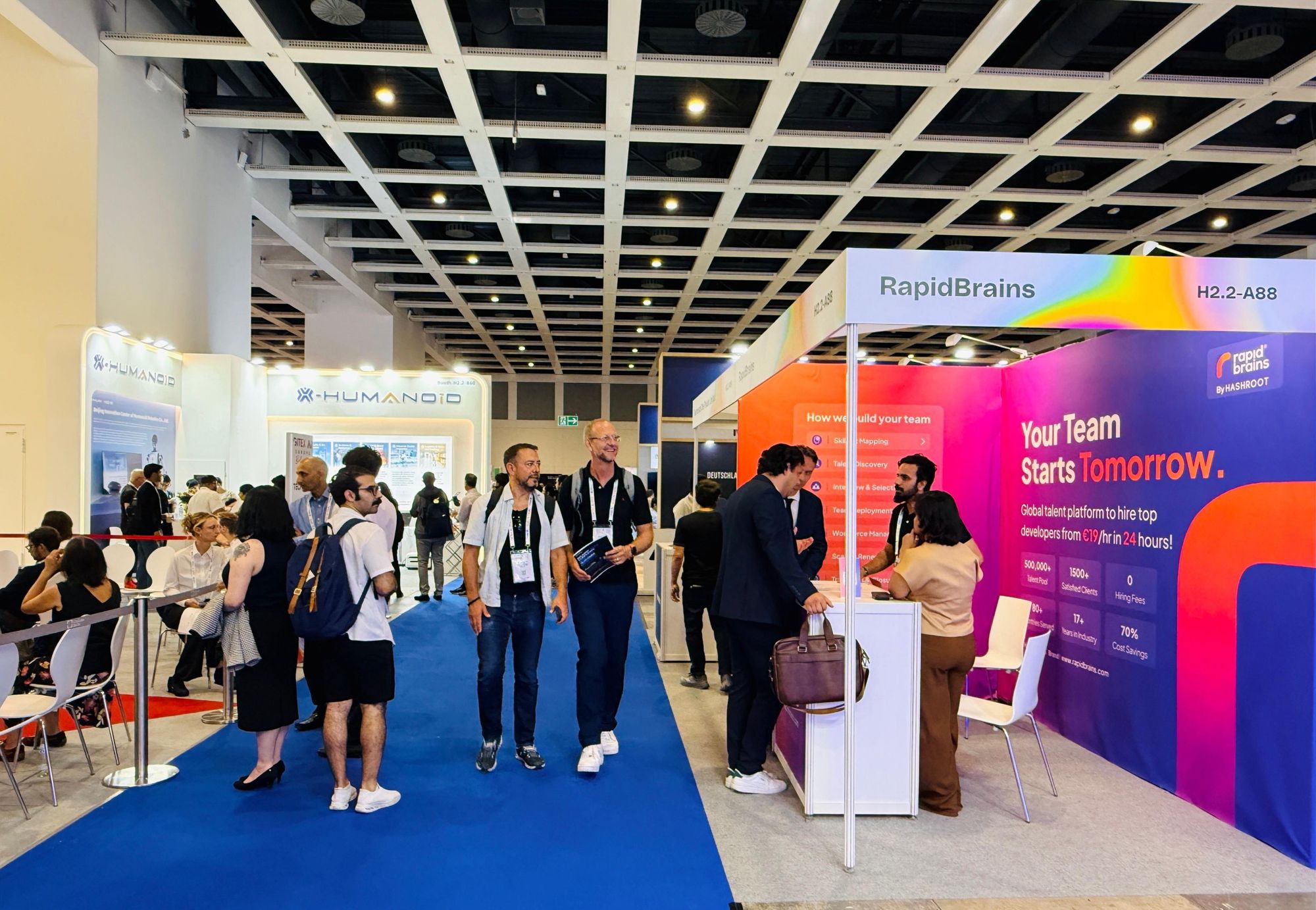 RapidBrains representatives at GITEX AI Europe in Berlin