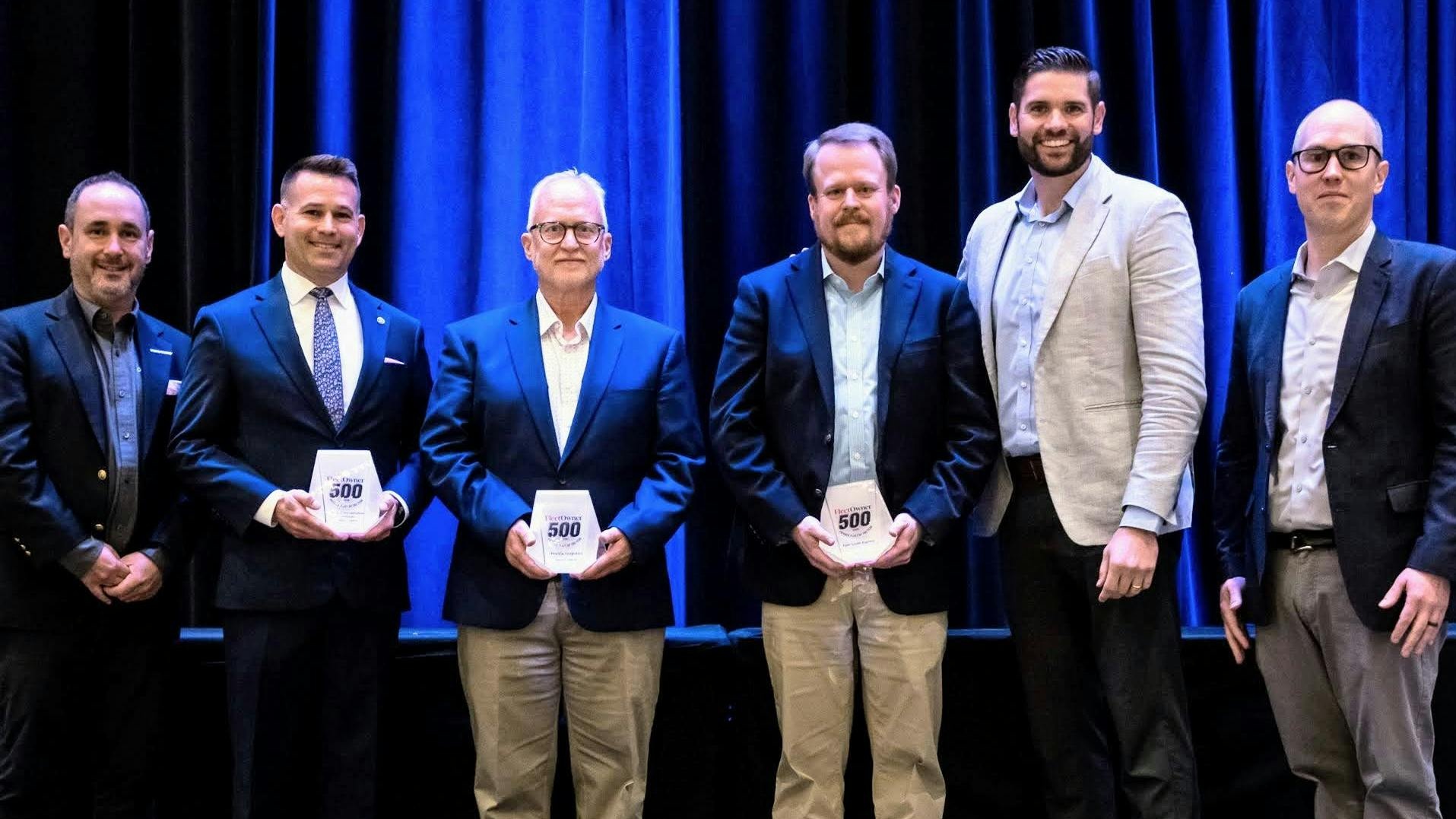 Hayden Cardiff, second from right, with Descartes and private fleet representatives at the 2026 NPTC awards presentation.