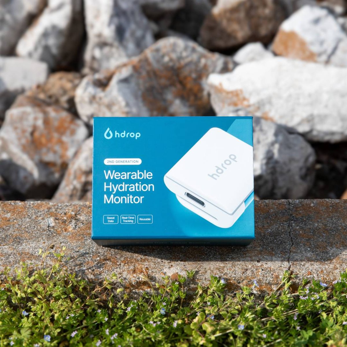hDrop Gen 2 wearable hydration monitor with its retail packaging