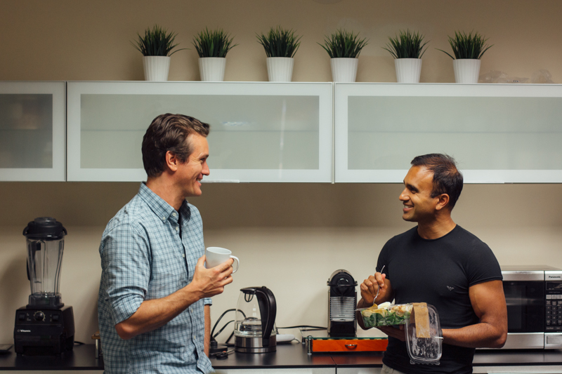 Health IQ founder Munjal Shah and colleague Jack Dunham preparing a healthy snack in the early company office
