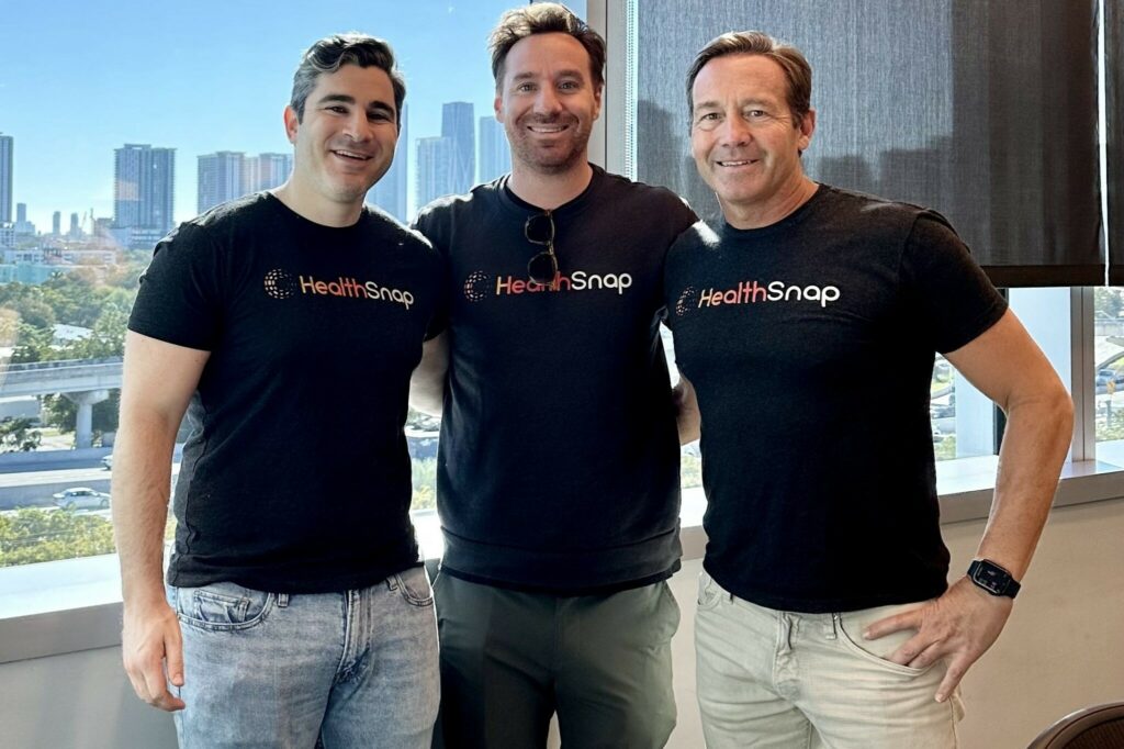 HealthSnap co-founders Samson Magid, Chase Preston and Wesley Smith standing together in matching company shirts