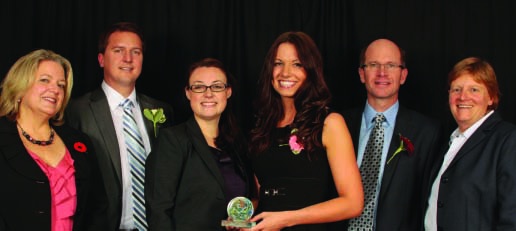 Six Desire2Learn representatives pose together at the 2012 Junior Achievement Business Spirit Awards; Heather Hennessy is fourth from the left.