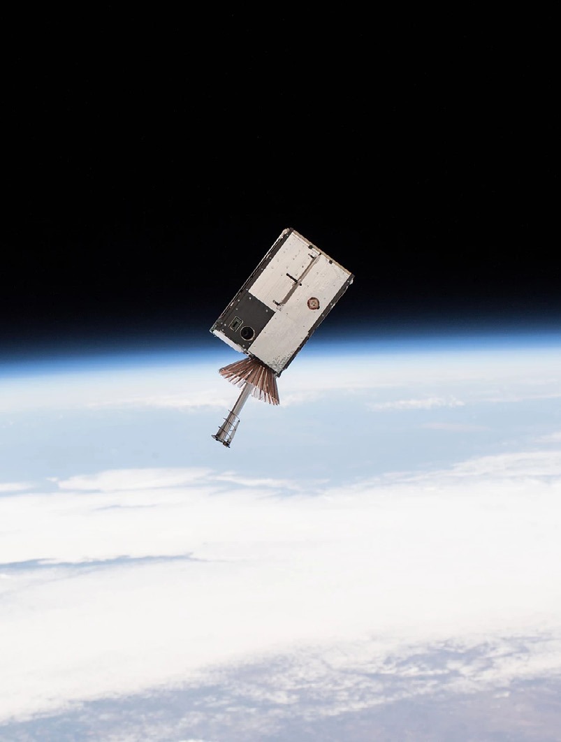 Hedron brochure image of a small satellite above Earth