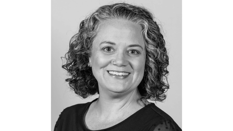 Black-and-white press portrait of Heidi Morin