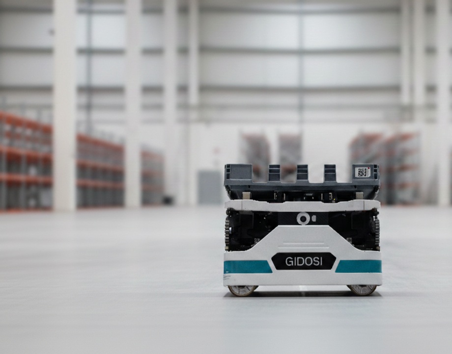 Warehouse automation equipment in Hellmann’s Exotec announcement photograph