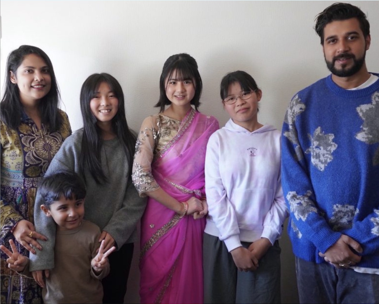 Japanese participants with an Indian host family during HelloWorld’s Ashinaga exchange program