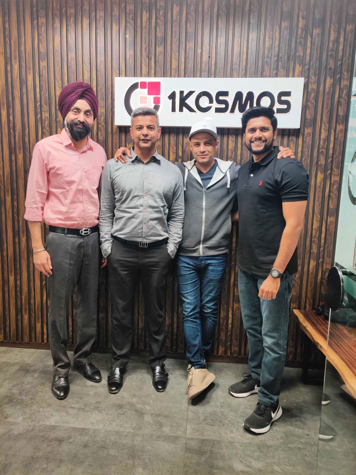 Hemen Vimadalal, wearing a cap, with colleagues at the 1Kosmos Mumbai office