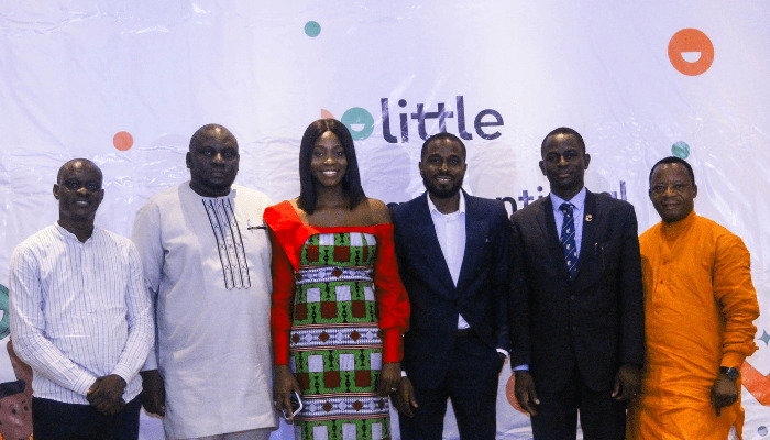 Henry Chibuzo Nnalue, fourth from left, with guests at the launch of Little in Lagos