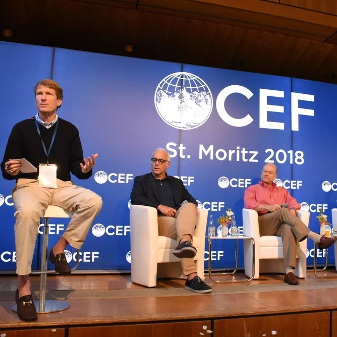 Henry Kaestner, seated at left, speaking on a panel at the 2018 Christian Economic Forum in St. Moritz