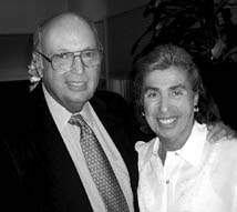 Henry and Marilyn Taub together in an archival black-and-white photograph