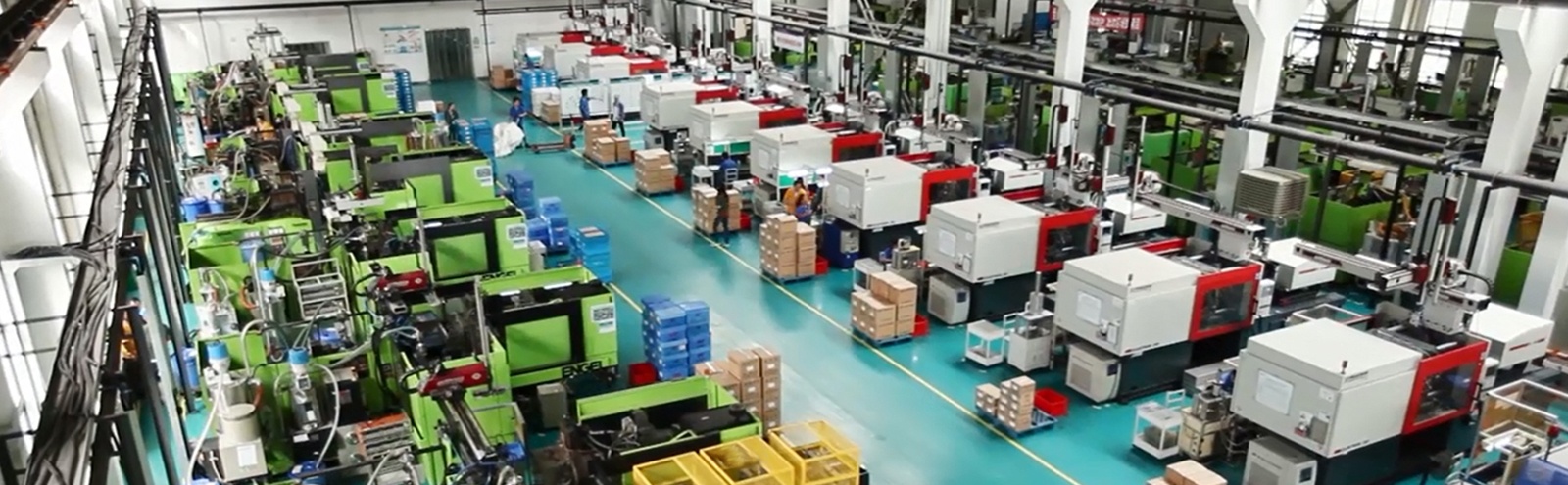 A Hi-P manufacturing floor with rows of injection-molding machines