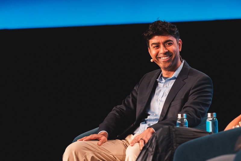 Himanshu Patel seated onstage at PayPal Beyond in April 2026