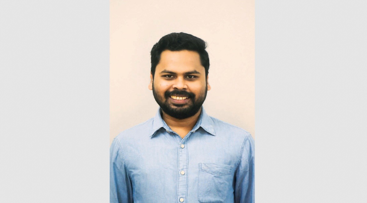 Portrait of Hirect India co-founder Raj Das in a blue shirt