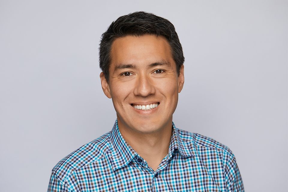Hiya founder and CEO Alex Algard in a checked shirt