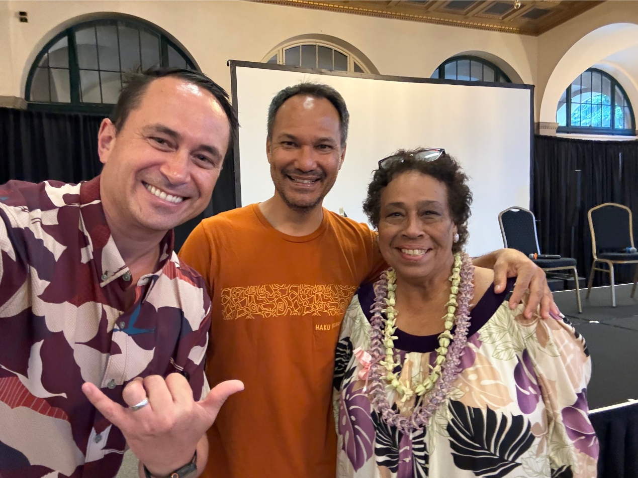 Hoala Greevy, at left, taking a selfie with Olin Lagon and Gloria Borland before an invention panel in Hawaiʻi.