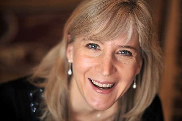 Holly Hamann smiling in a close portrait