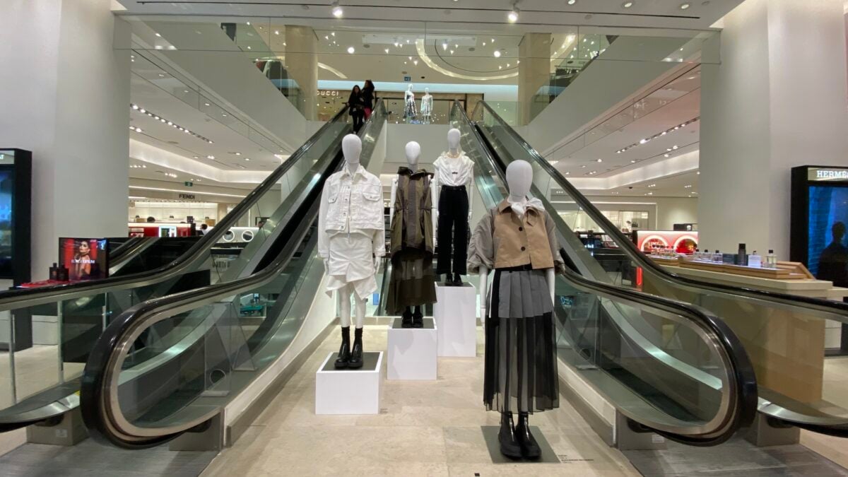 Mannequins displayed between escalators inside Holt Renfrew's Bloor Street flagship