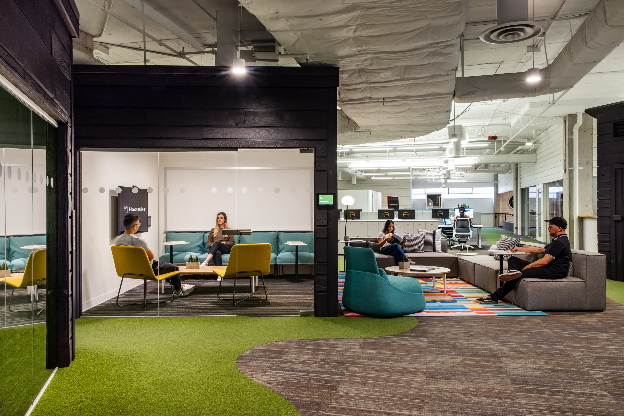 A colorful collaborative area inside Hootsuite's Vancouver office