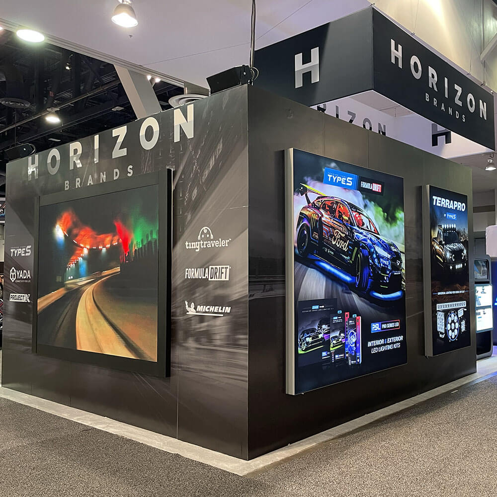 Horizon Brands exhibition booth displaying TYPE S, Tiny Traveler, PROJECT X and Michelin product graphics