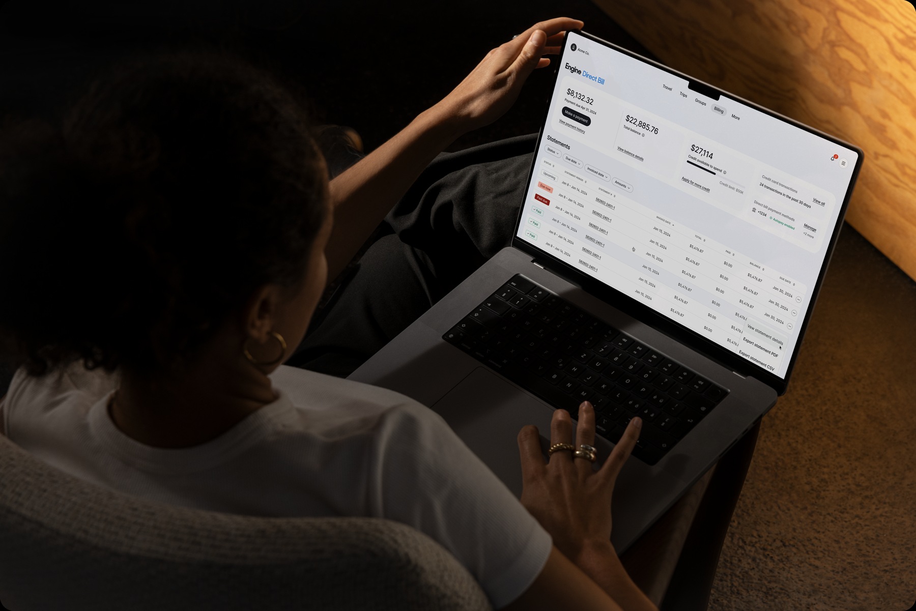 Engine Direct Bill displayed on a laptop, showing consolidated statements and balances