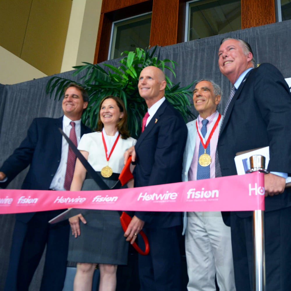 A ribbon-cutting photograph from Hotwire’s 2016 headquarters milestone
