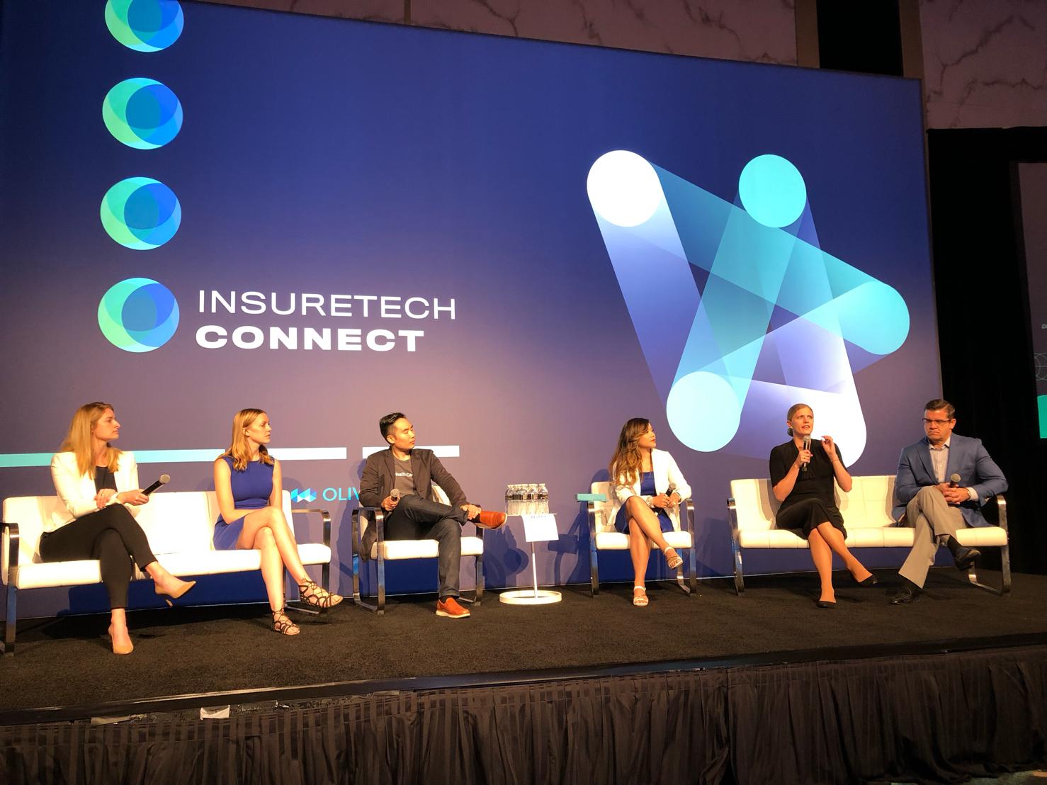 Howard Yeh, third from left, seated with five other speakers at InsureTech Connect