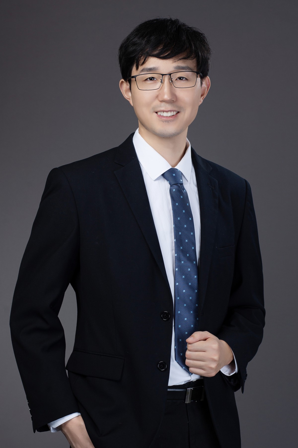 Yang You, founder of HPC-AI Tech, in a formal portrait