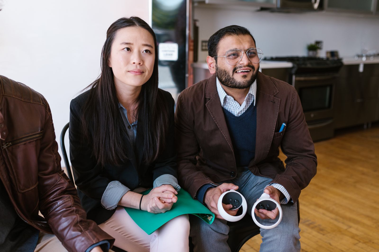 Two colleagues participating in a collaborative office session