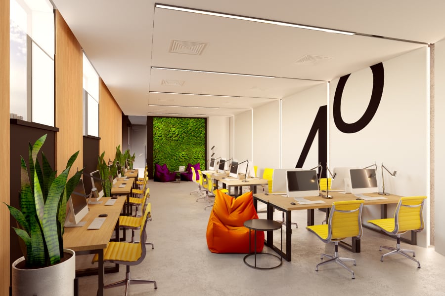 HUB 4.0 Campus promotional visualization with shared desks, yellow chairs and an orange beanbag