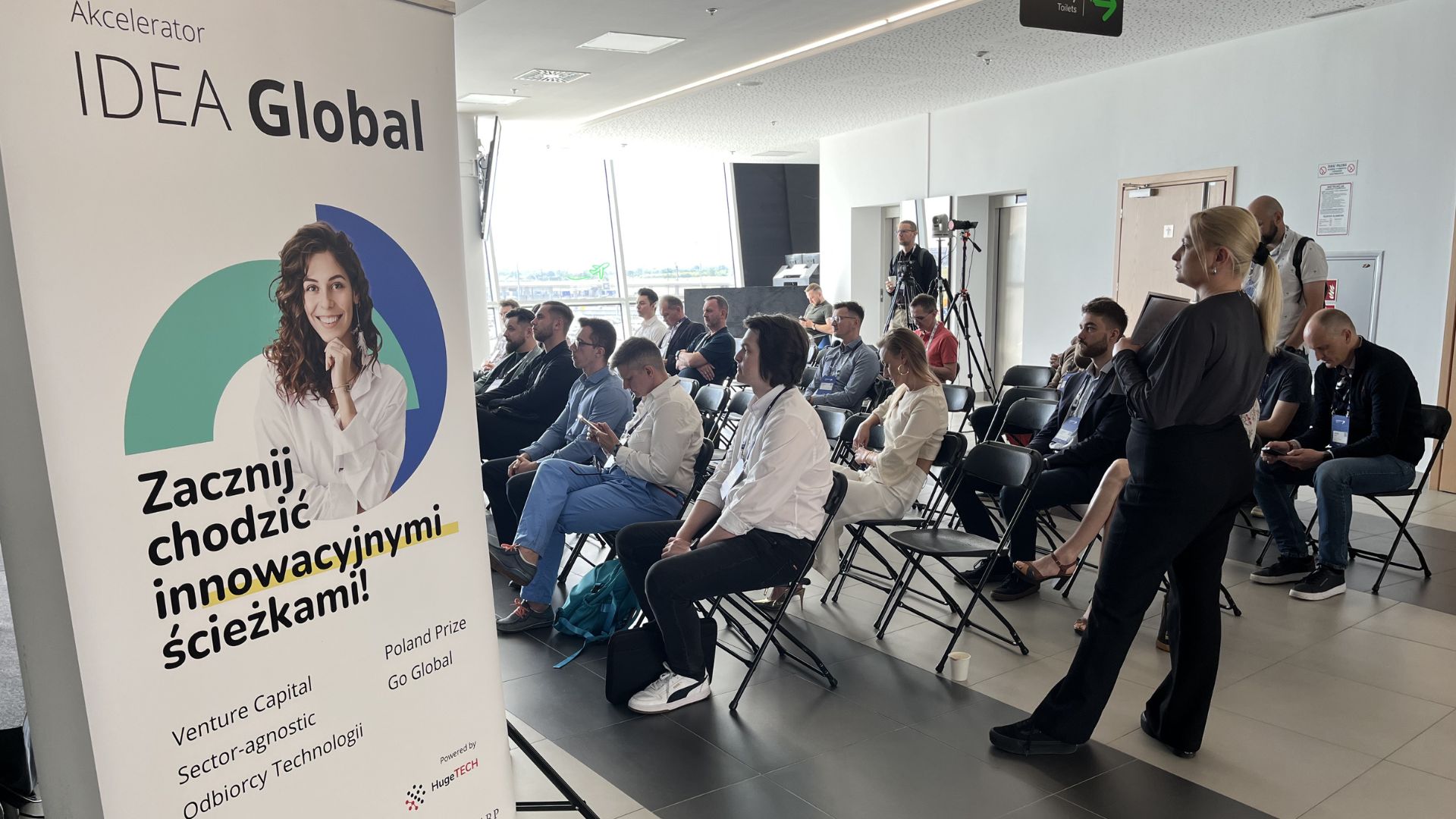 Audience seated beside an IDEA Global banner at the 2026 Demo Day