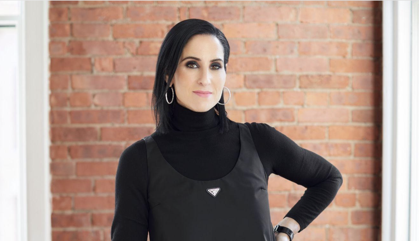 Hunt & Gather founder and CEO Jolie Hunt in front of a brick wall