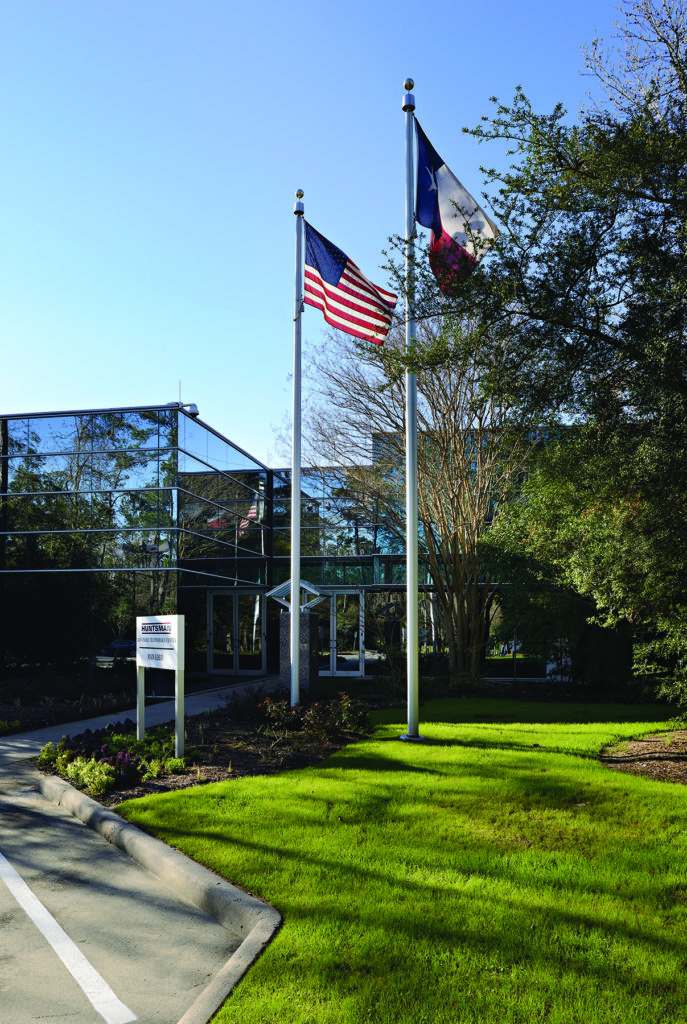 Flags outside Huntsman’s glass-fronted Advanced Technology Center in The Woodlands, Texas